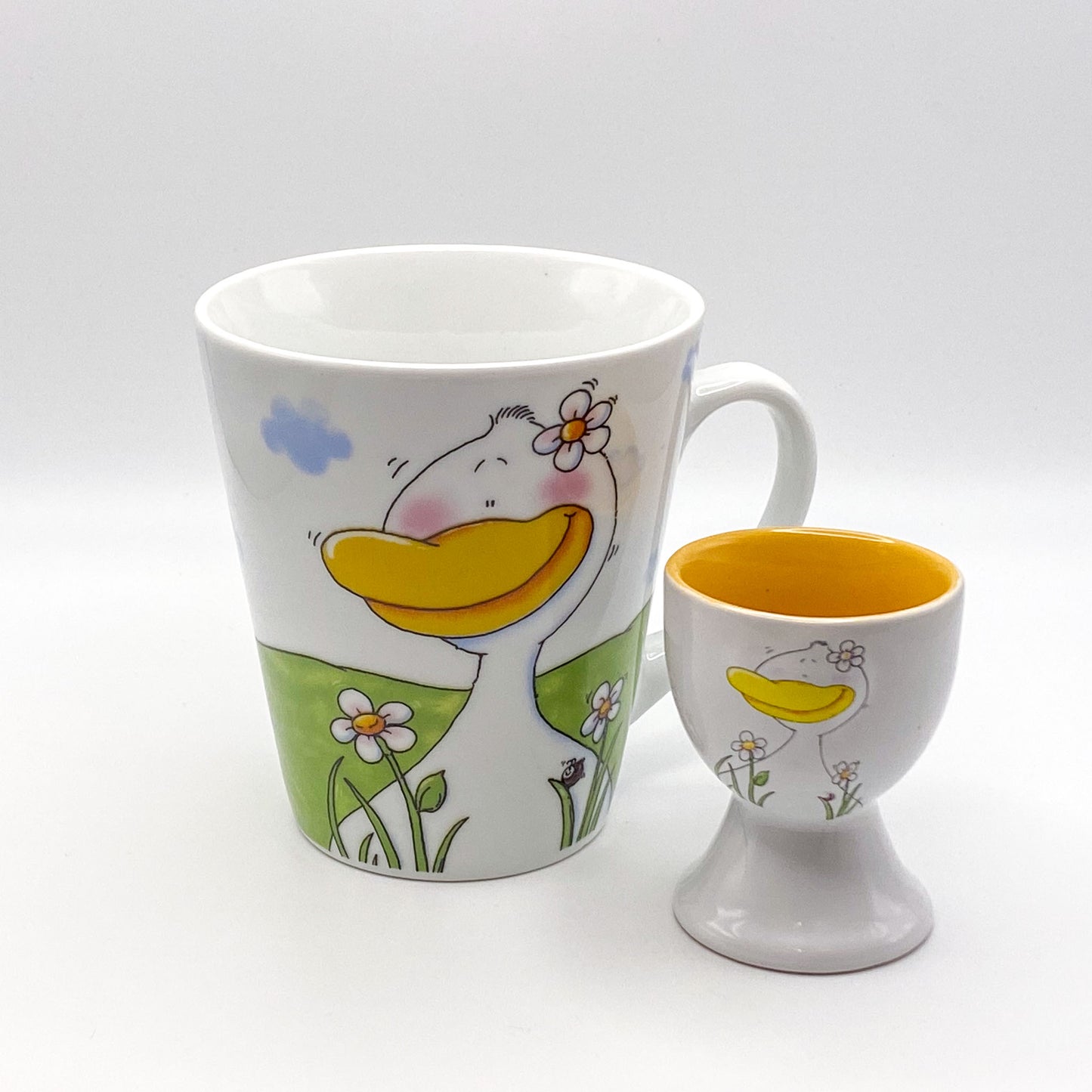 Becher "Schweinchen" und Eierbecher "Schweinchen" und "Gänschen" von NANA